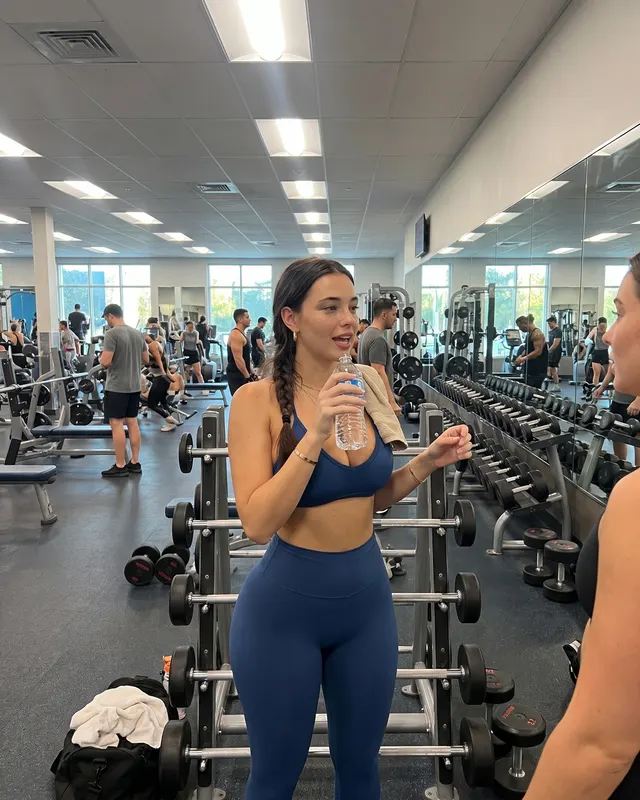 Gym / Fitness AI photoshoot sample 5 of 5: natural candid Instagram-style photo of the same woman, different outfit and pose